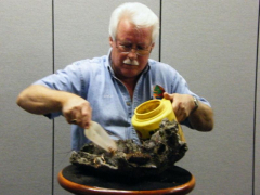 rs-05-ernie-preparing-rock_med